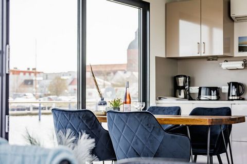 Relaxation on the water - floating holiday home - completely renovated in 2023 - with that certain something: The modern and high-quality furnished floating house is firmly anchored in the small city harbor of Ribnitz-Damgarten. Enjoy 360-degree view...